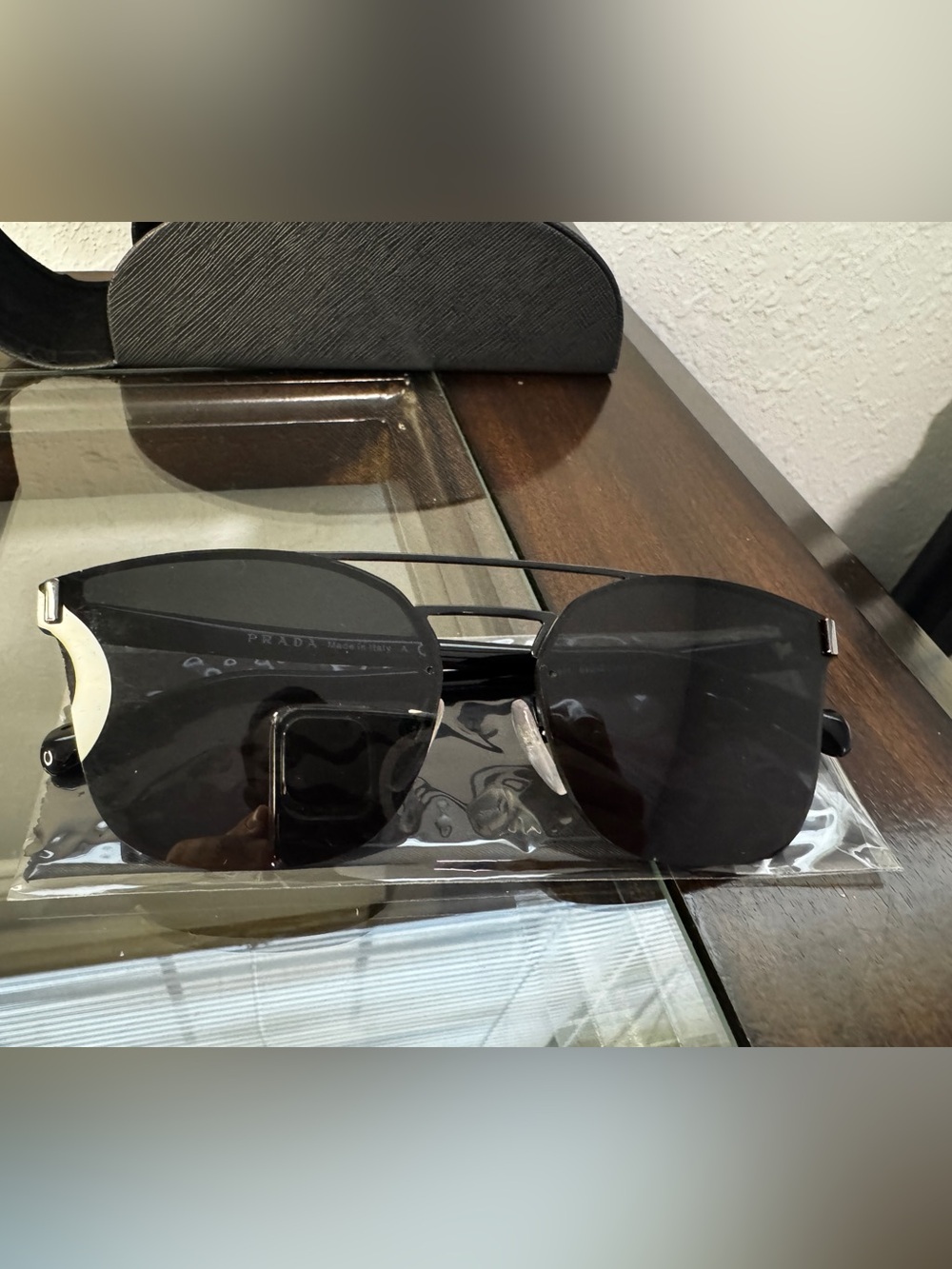 Prada Women's Black Metal Rimless Sunglasses
